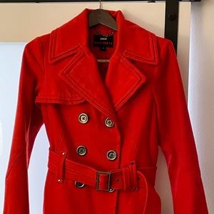 Awesome red coat with belt. Vintage vibes.
